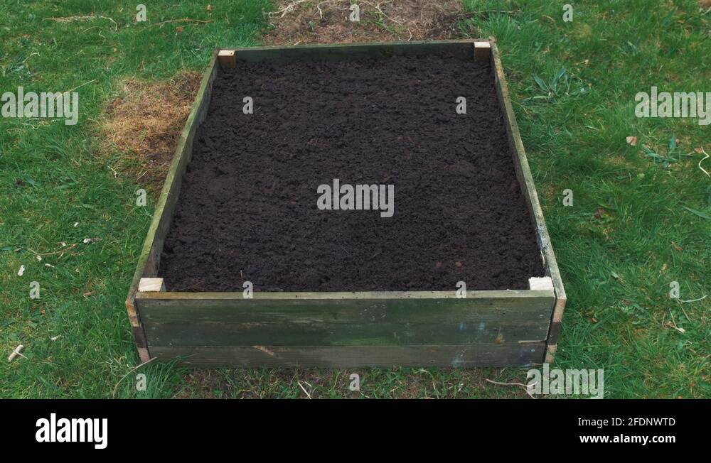 Raised Garden Bed with compost jib crane shot 4K Stock Video Footage