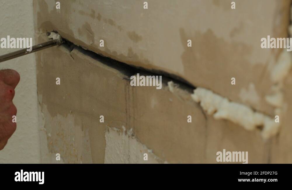 Filling crack wall Stock Videos & Footage HD and 4K Video Clips Alamy