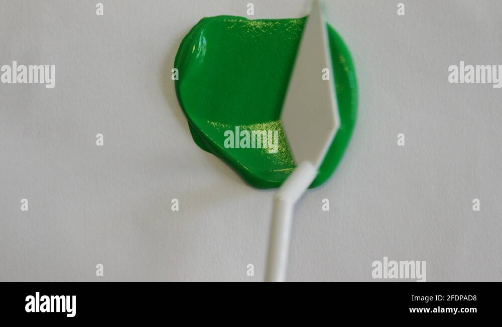 Spreading Green Paint On Canvas With Spatula, Green Screen Background Stock Video Footage Alamy