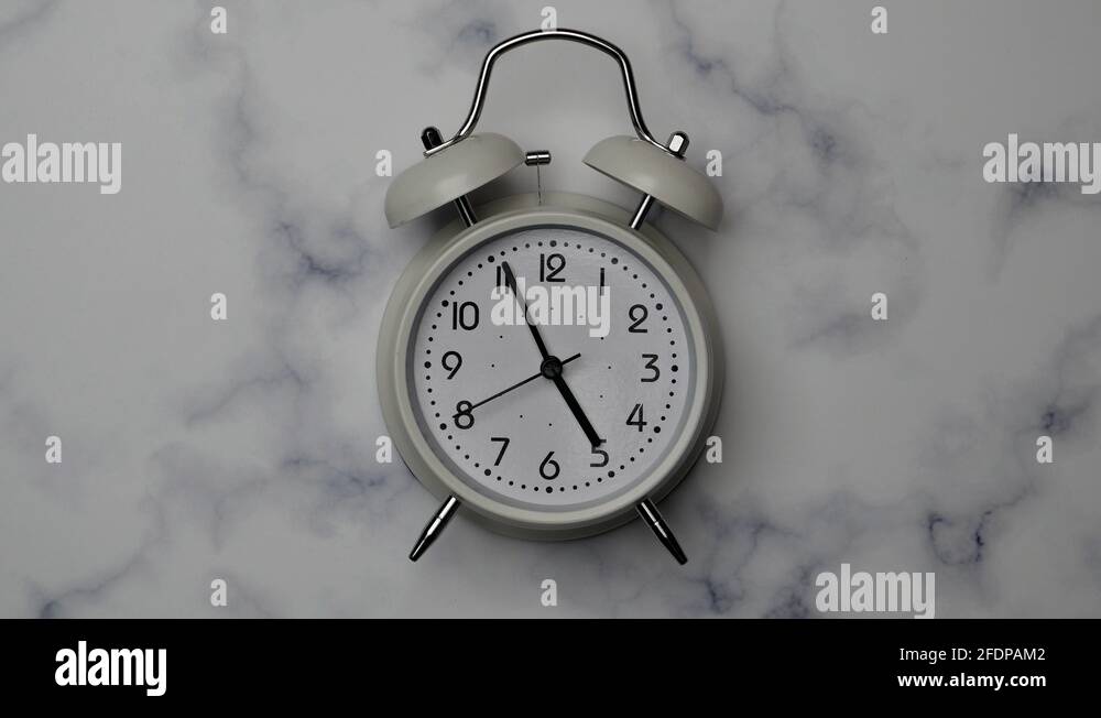Classic Vintage White Alarm Clock With Five Minutes Countdown Before