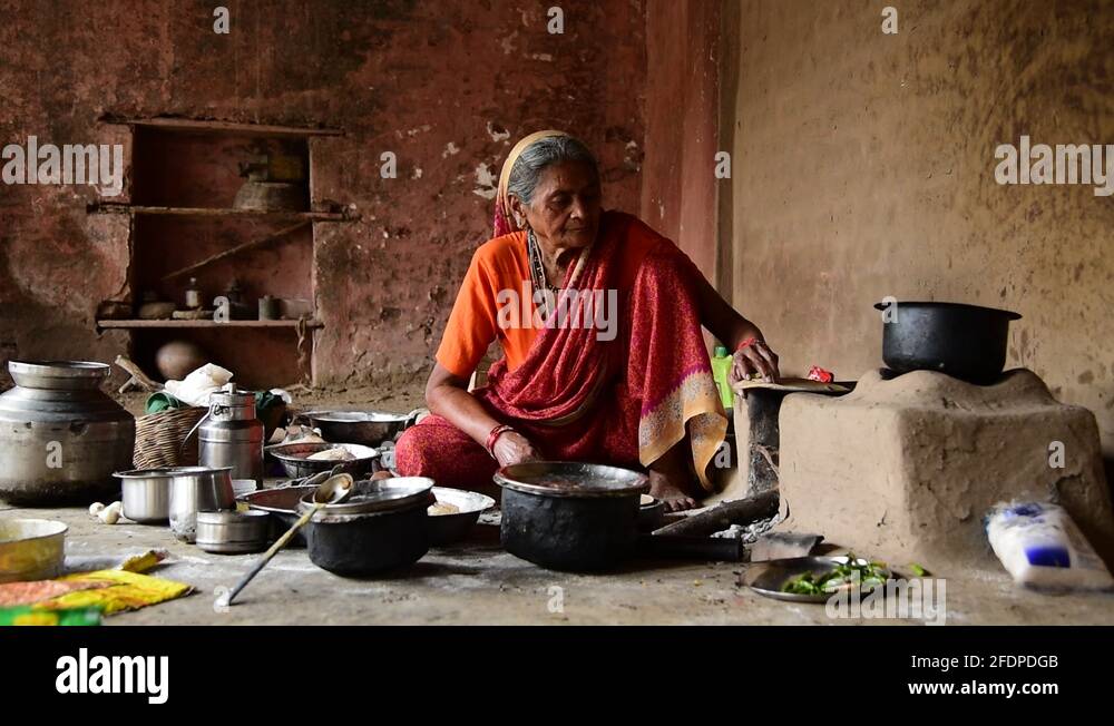 Indian village woman cooking Stock Videos & Footage - HD and 4K Video ...