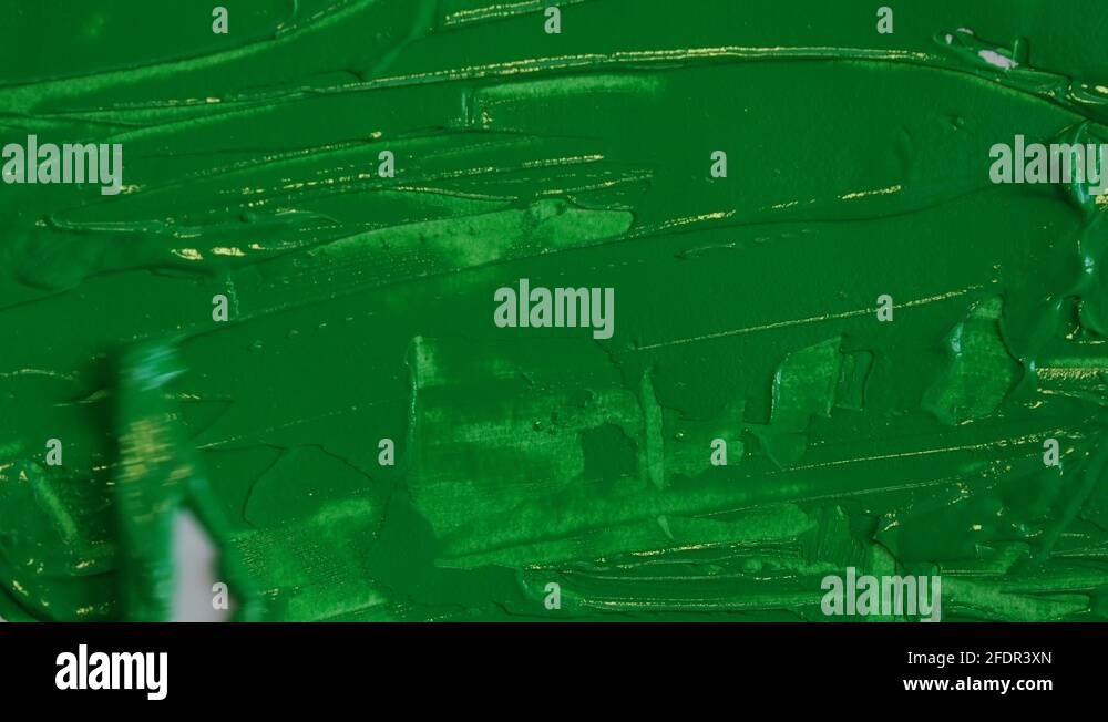 Spreading Green Screen Paint On Canvas With Spatula, Chroma Key Stock Video Footage Alamy