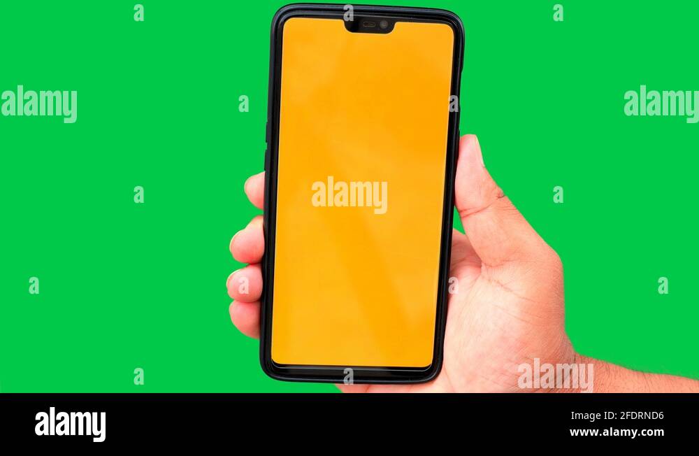 Phone with yellow display on green screen background Stock Video
