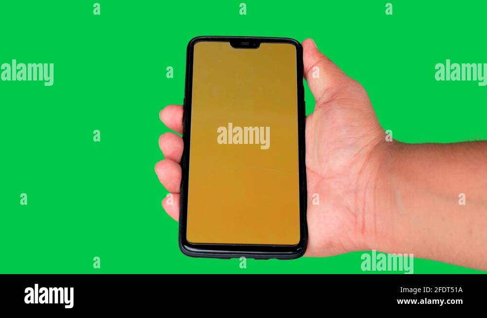 Phone with yellow display on green screen background Stock Video