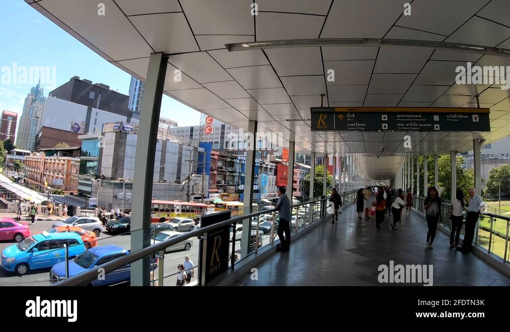 Ratchaprasong R Walk People walking on Ratchaprasong SkyWalk, aka R Walk Stock Video Footage ...