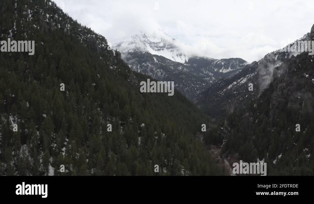 Drone shot of the snow covered mountains. in the high altitude of Utah