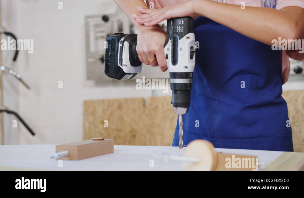 Close Up Of Trainees In Learning How To Use Power Tools To