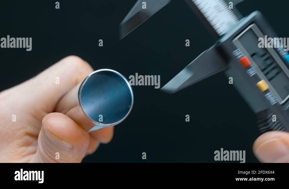 Measurement of the diameter of the pipe with a modern digital caliper