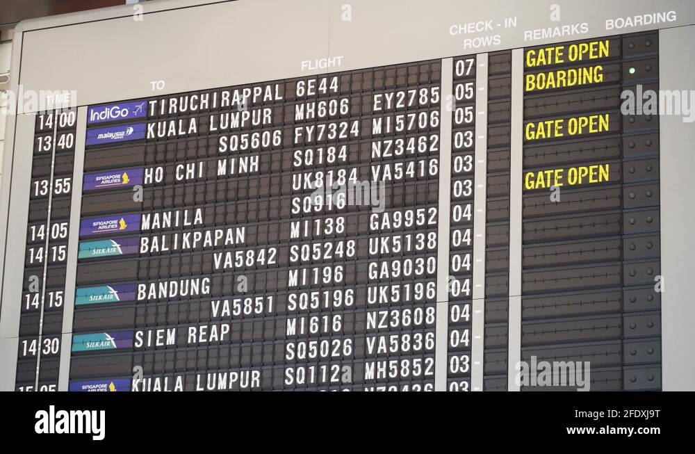 Singapore Changi Airport Terminal Two Solaris Board Flipping Wide Shot ...