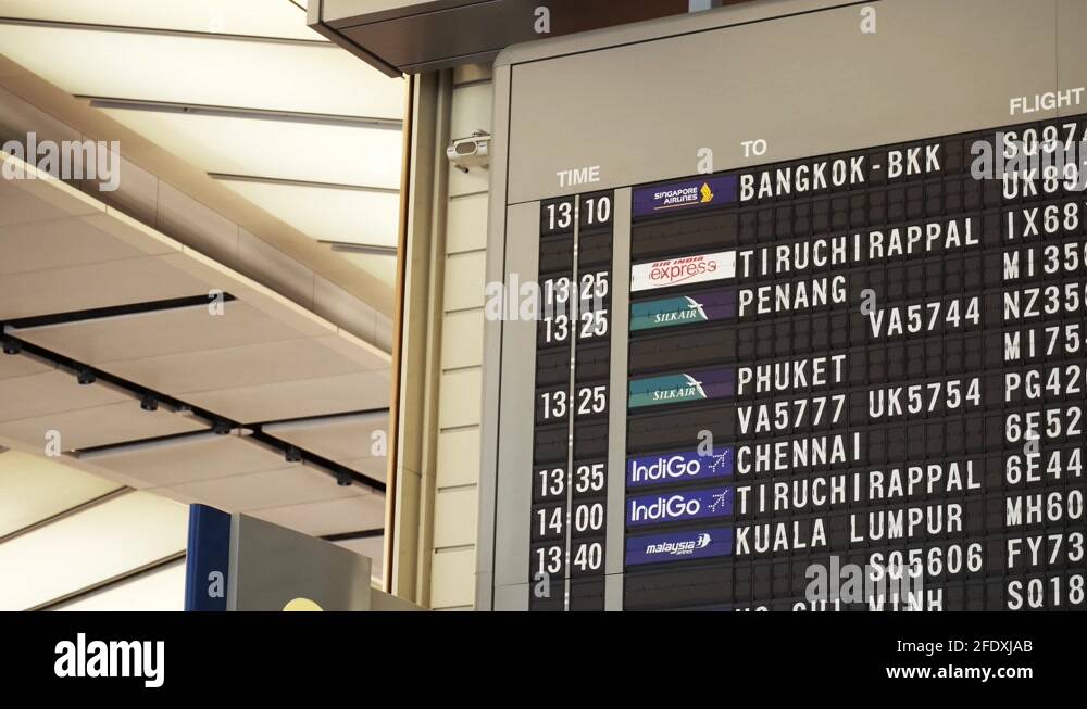 Singapore Changi Airport Terminal Two Solaris Board Close Up Slow Pan ...