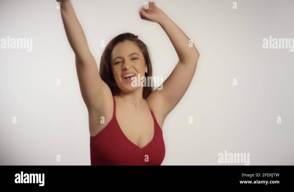 Dancing Woman Blows Party Blower Stock Video Footage - Alamy