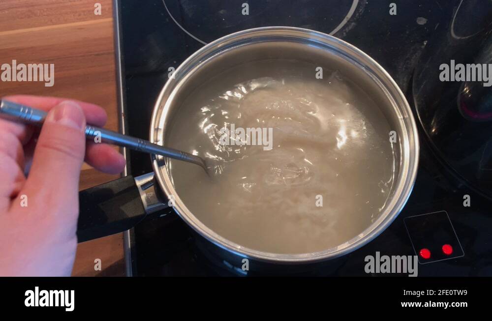 Dry cooking rice saucepan Stock Videos & Footage HD and 4K Video