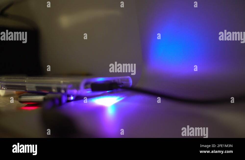 Close up of usb hard disks with red and blue blinking lights Stock