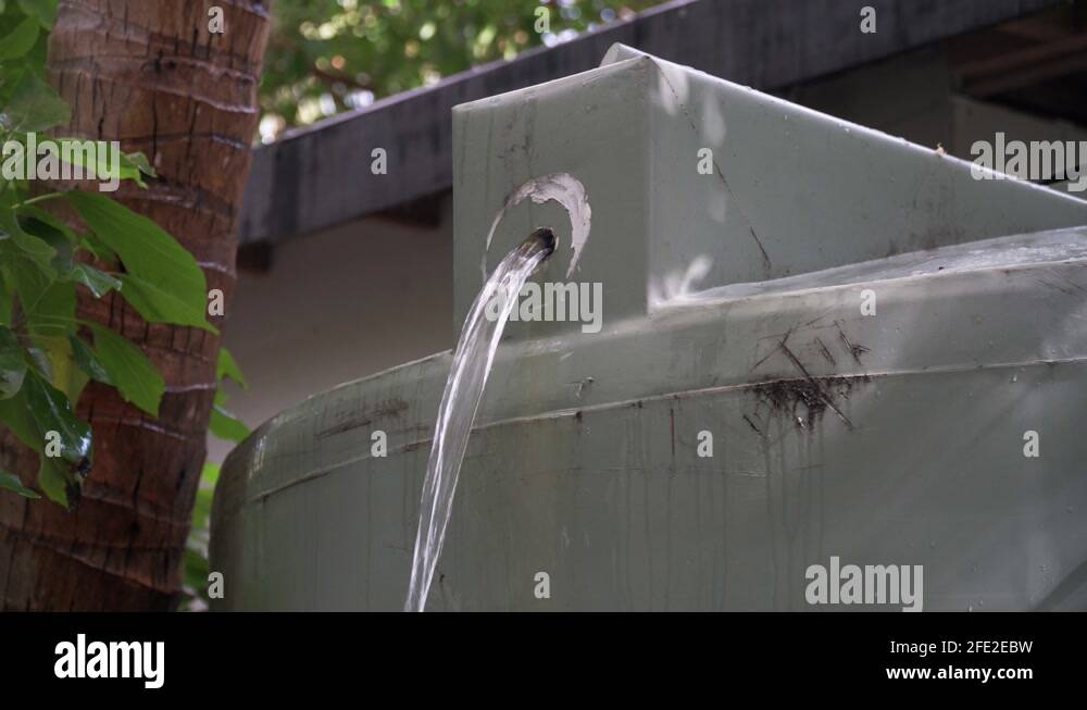 Image showcasing Overflow of saltwater from tank at a desalination plant, static shot ...