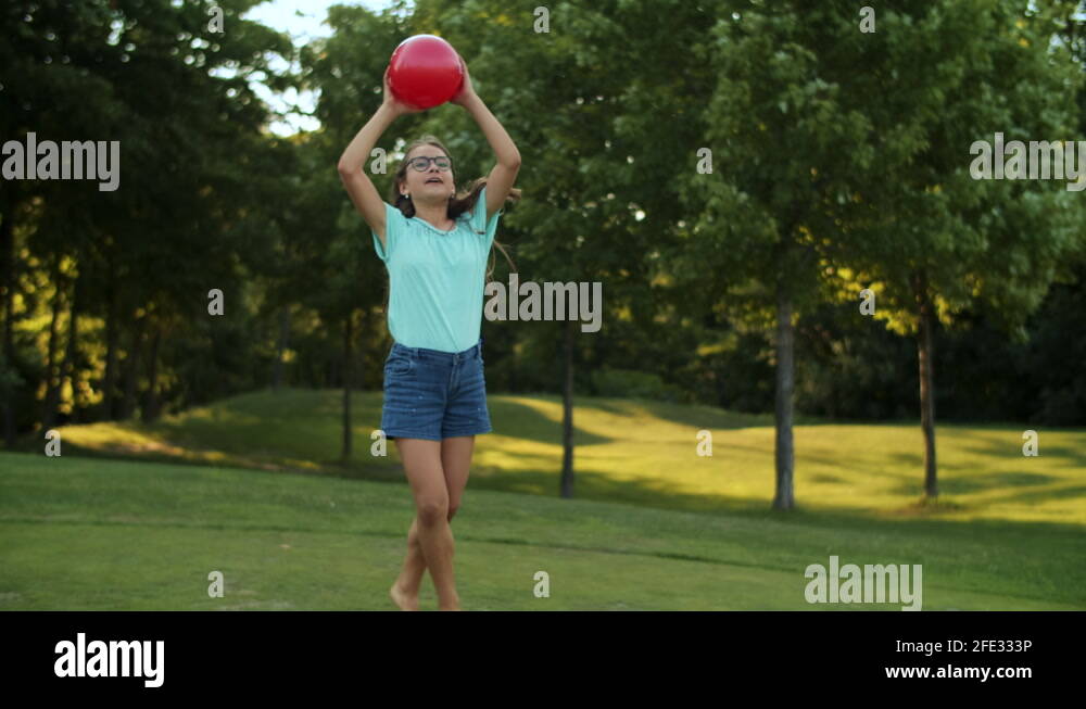Young girl throwing ball air Stock Videos & Footage HD and 4K Video