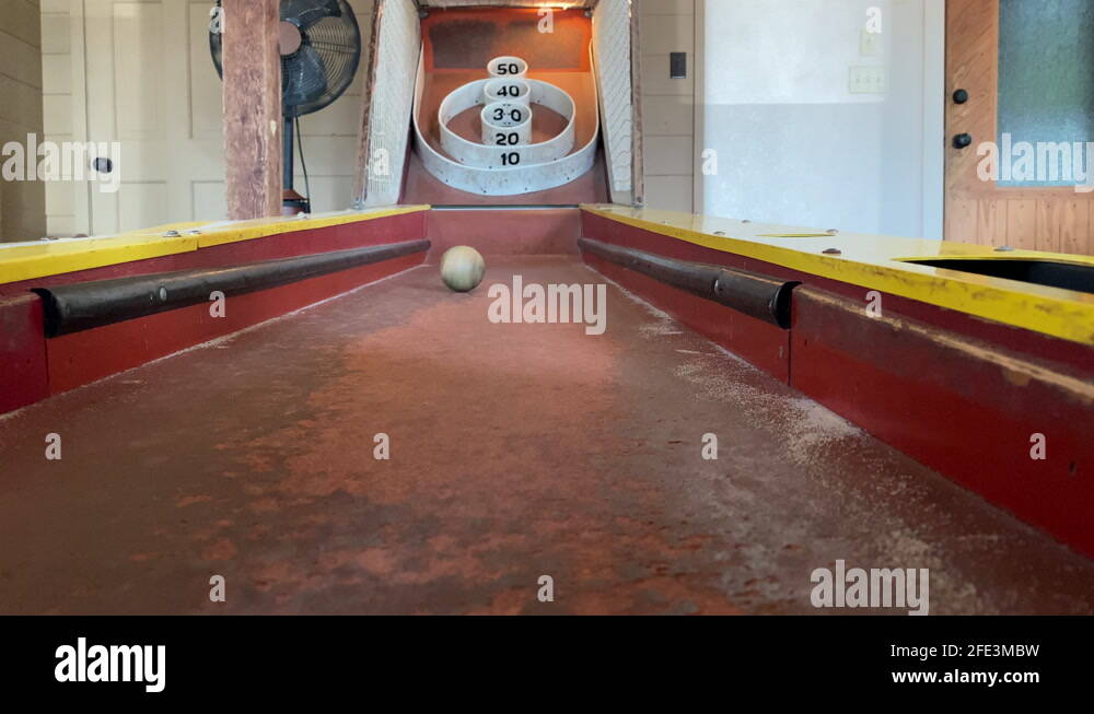 Ball Rolling Up A Classic SkeeBall Ramp Stock Video Footage Alamy