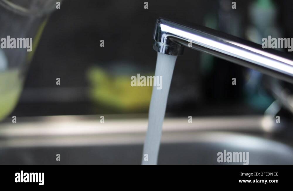 Glass jug tap Stock Videos & Footage HD and 4K Video Clips Alamy