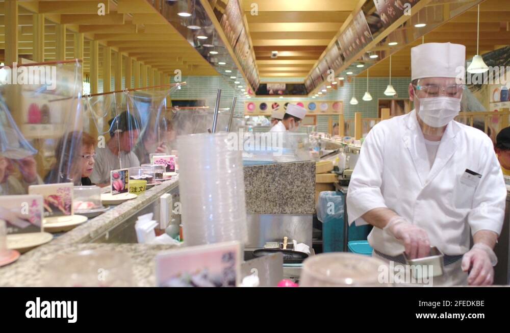 Scene Inside Kaiten-zushi (Conveyor Belt Sushi) Restaurant In Tokyo ...
