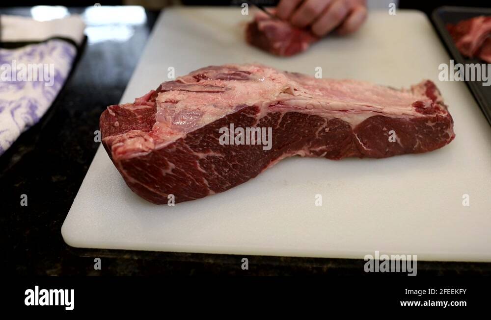 Butchering meat kitchen Stock Videos & Footage HD and 4K Video Clips