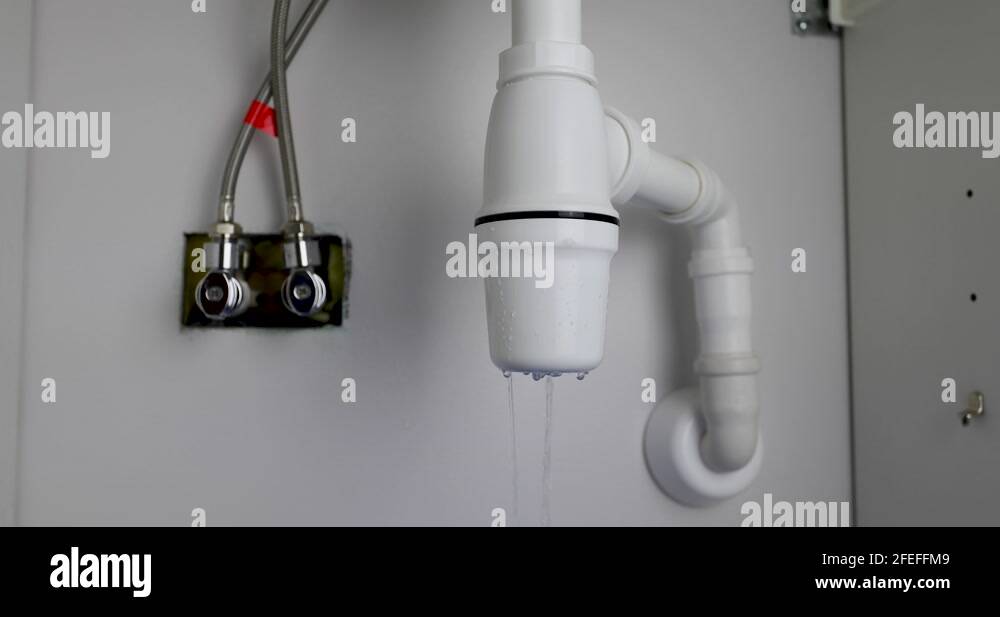 leaking sink trap. broken siphon. sewage water leakage Stock Video