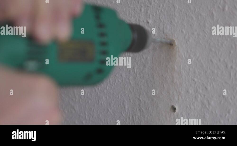 Drill holes in a wall Stock Videos & Footage HD and 4K Video Clips