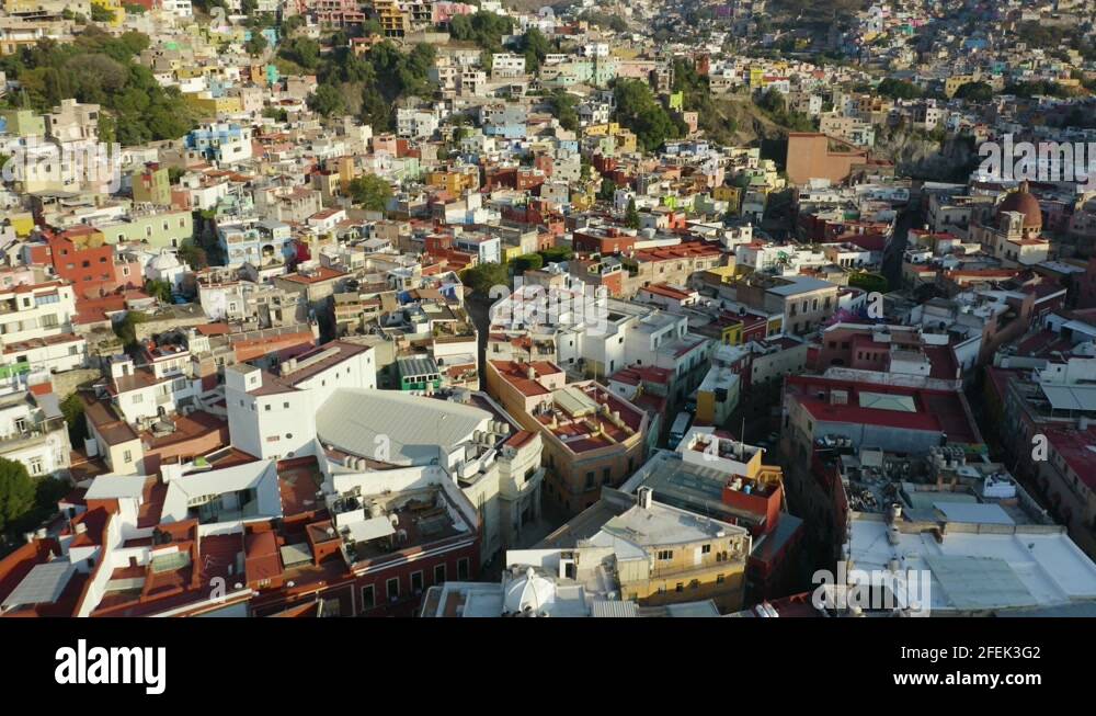 Drone Flies Above City Built into Mountains: Guanajuato City, Mexico ...