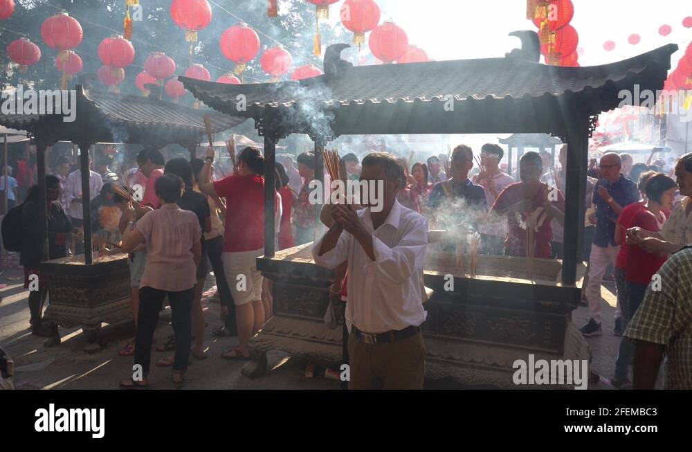 Pray for good luck from deities Stock Video Footage Alamy