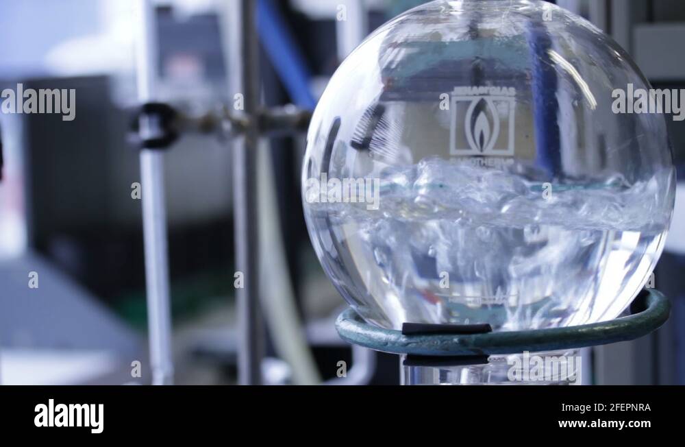 boiling water in chemistry lab Stock Video Footage Alamy