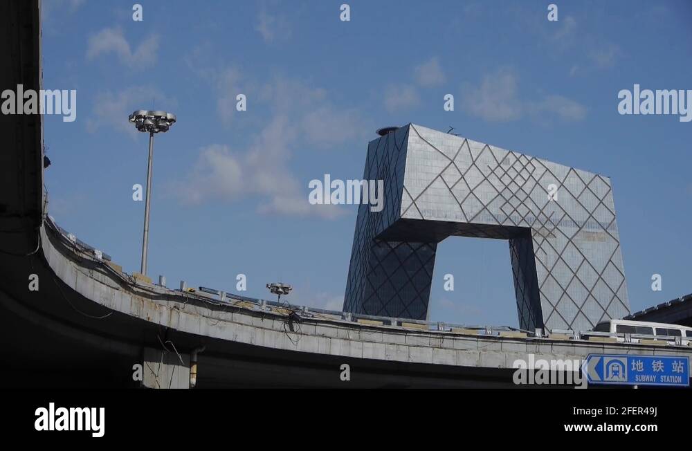 china beijing TV station buildings & busy overpass traffic Stock Video ...