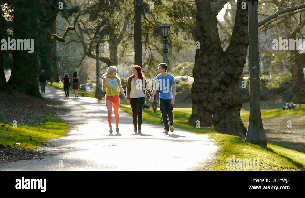 She s in the park. Парк друзья. Друзья в парке. Go to the Park. Улица идут парк друзья.