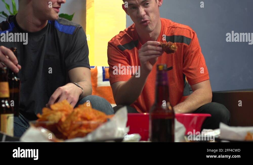 Eating wings Stock Videos & Footage HD and 4K Video Clips Alamy