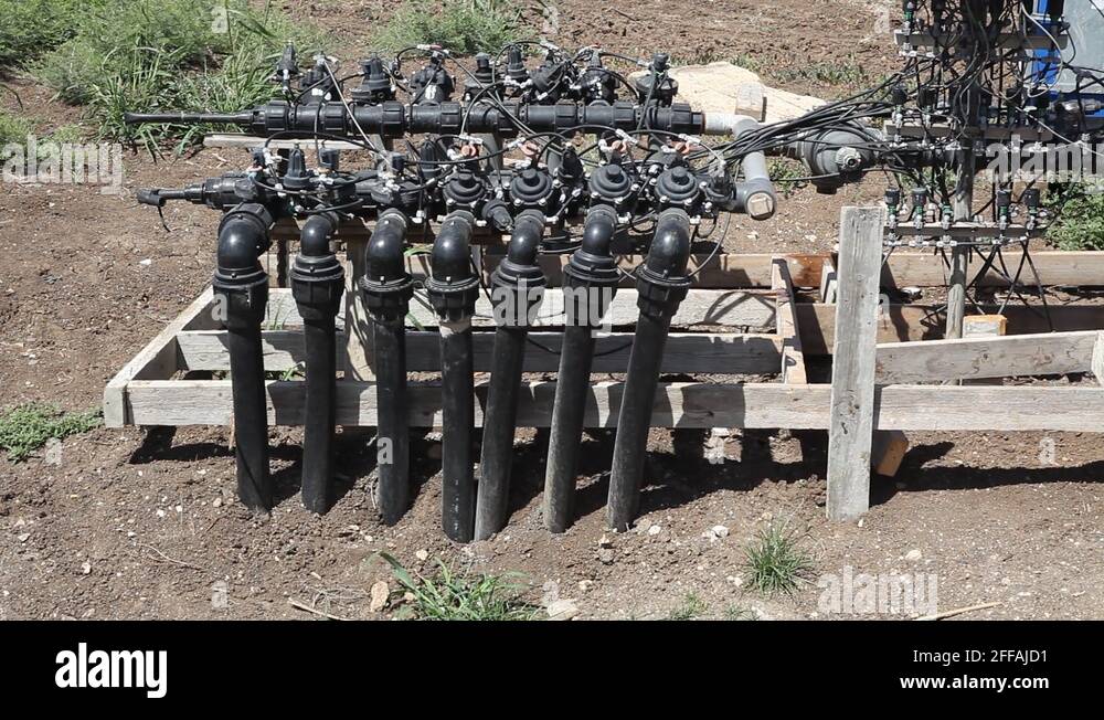 Automatic irrigation system with tubes and solenoids valves Stock Video