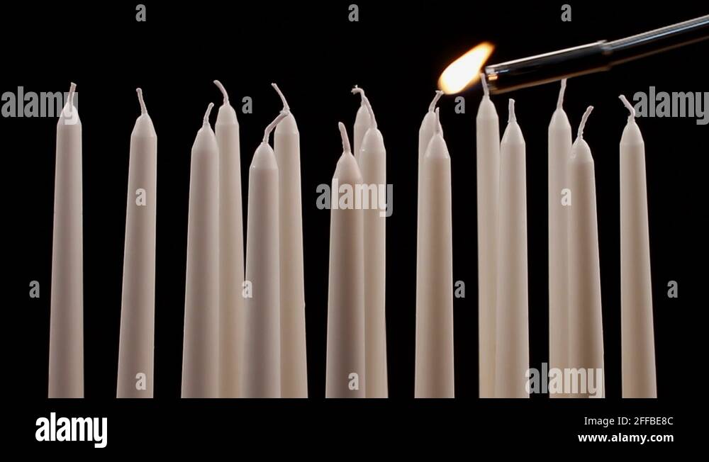 White taper candles Stock Videos & Footage HD and 4K Video Clips Alamy