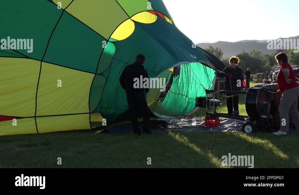 Family filling hot air balloon ready for takeoff 4K 031 Stock Video