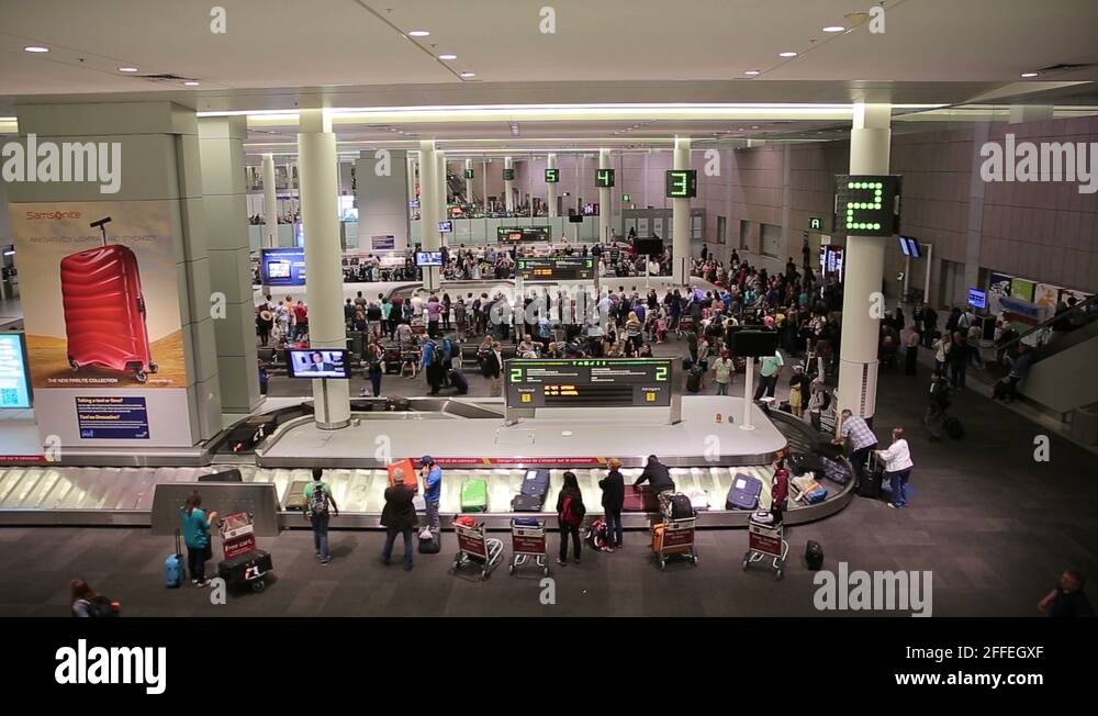 Baggage claim area in Toronto Pearson airport terminal Stock Video