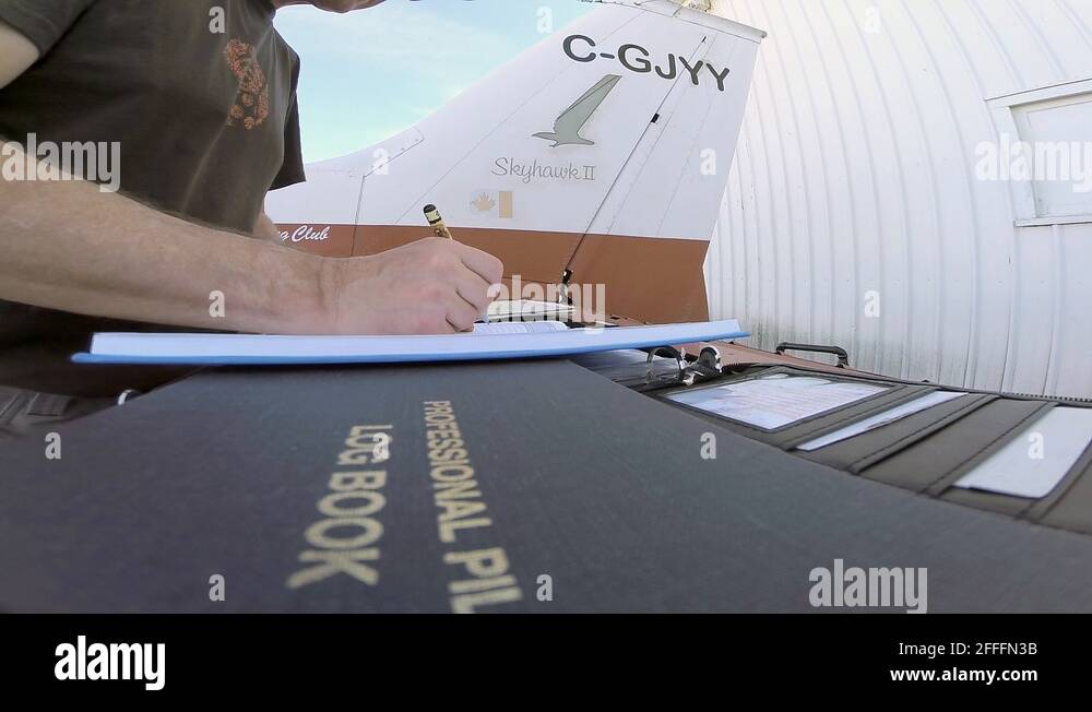 Pilot logging a flight Stock Video Footage Alamy