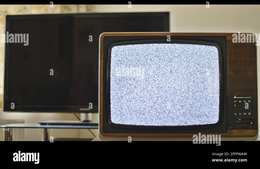 Outdated anologue TV next to LED TV 4K Stock Video Footage Alamy
