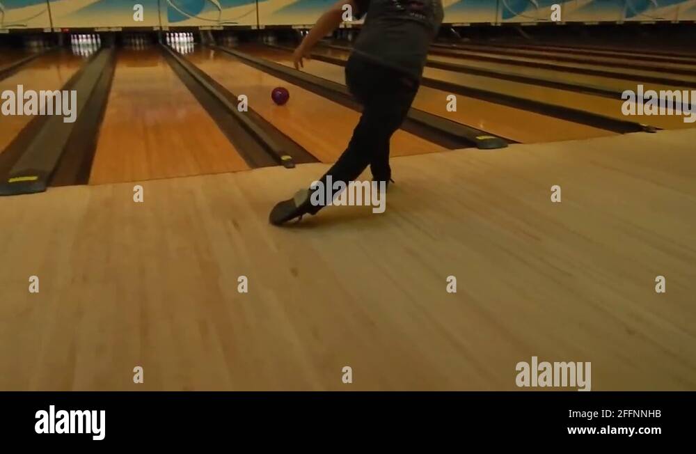 man throwing bowling ball down alley Stock Video Footage Alamy
