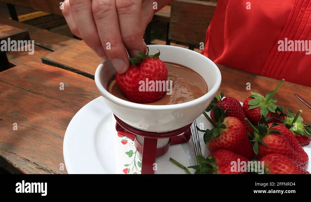 Strawberry dipping in chocolate sauce Stock Videos & Footage HD and