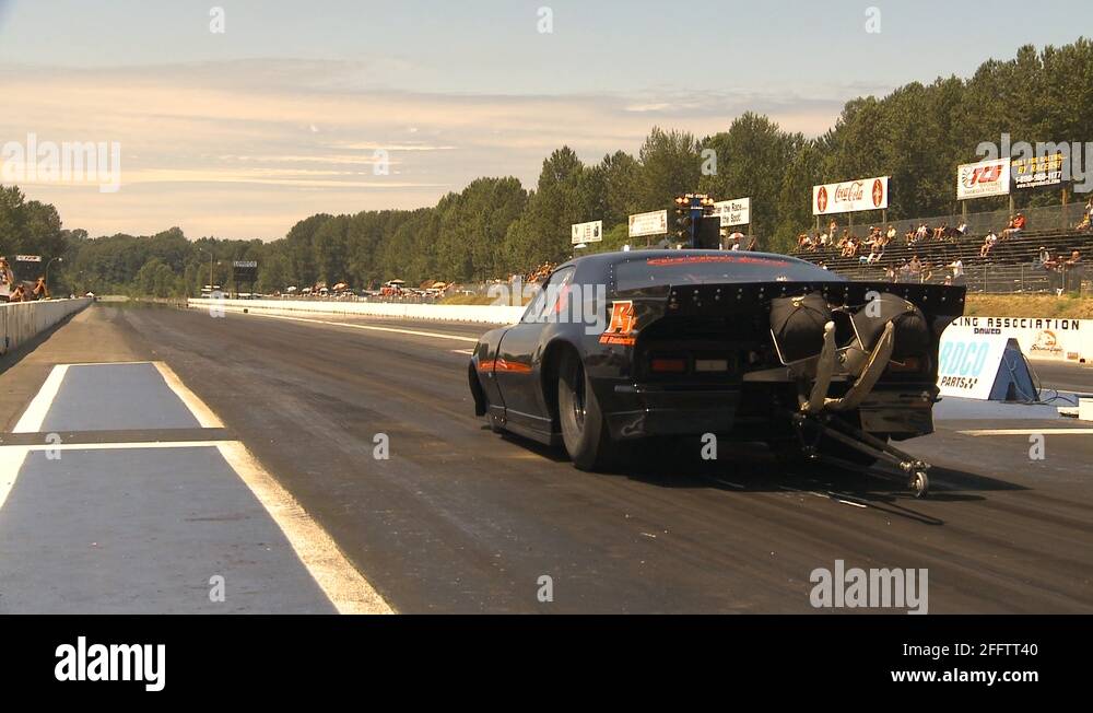 motorsports, drag racing launch, Gen 3 Camaro reverse angle Stock Video