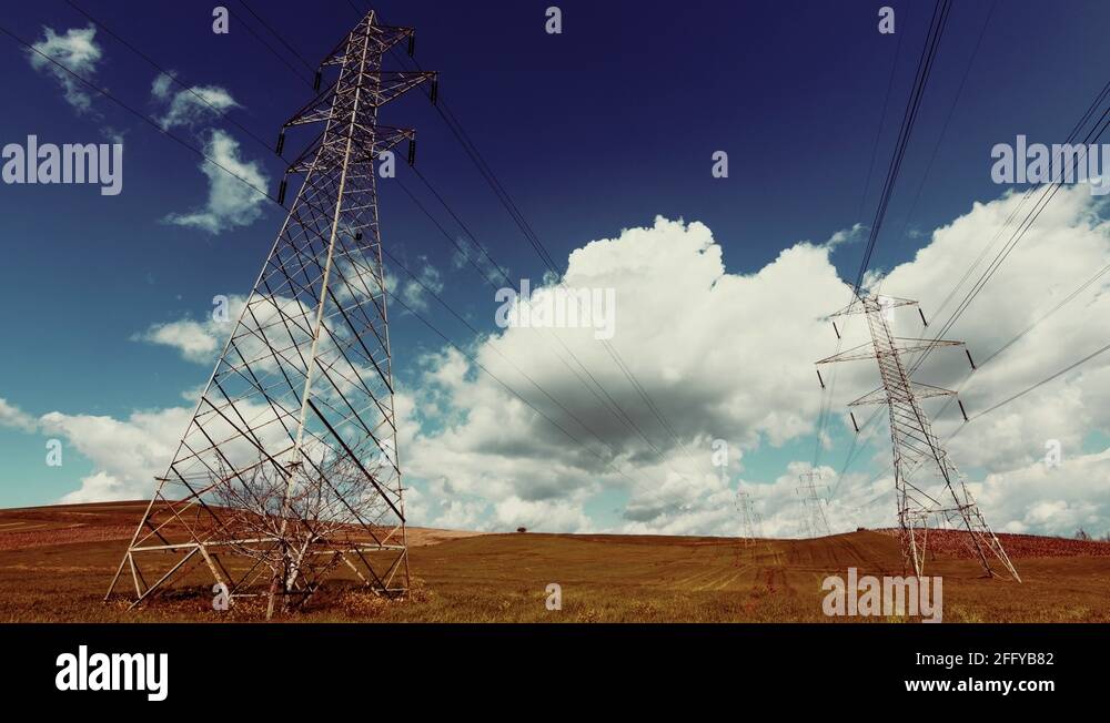 Electricity,high voltage pylons,power transmission lines,cinematic