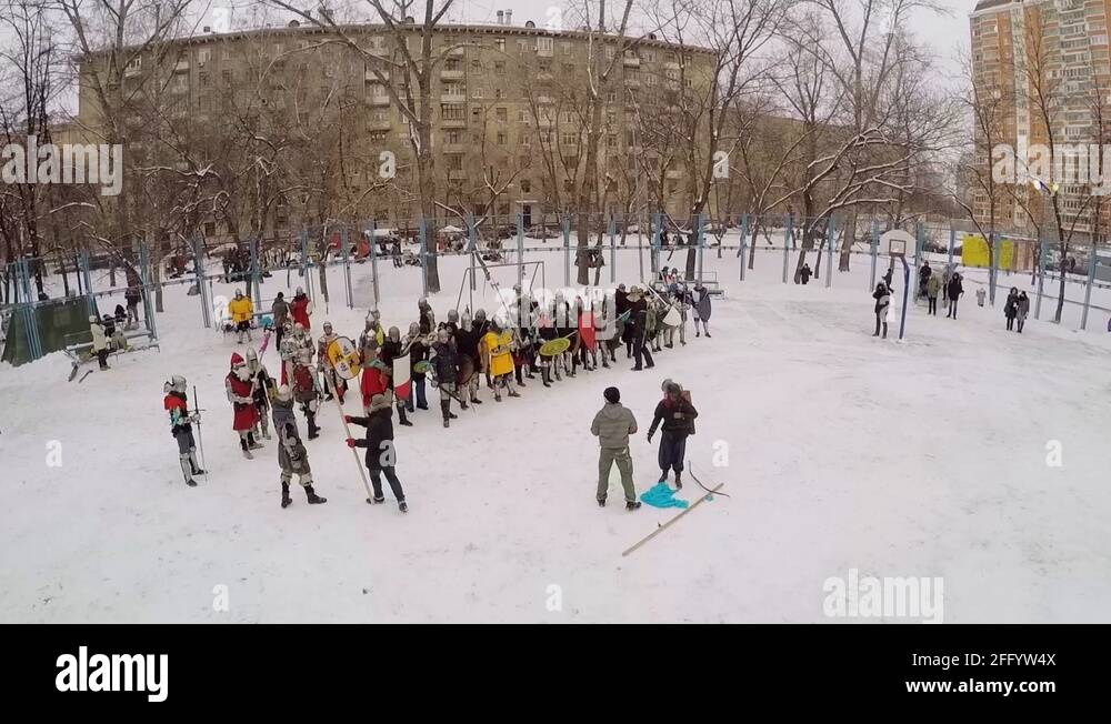 Many people in armour hold shields and swords Stock Video Footage Alamy