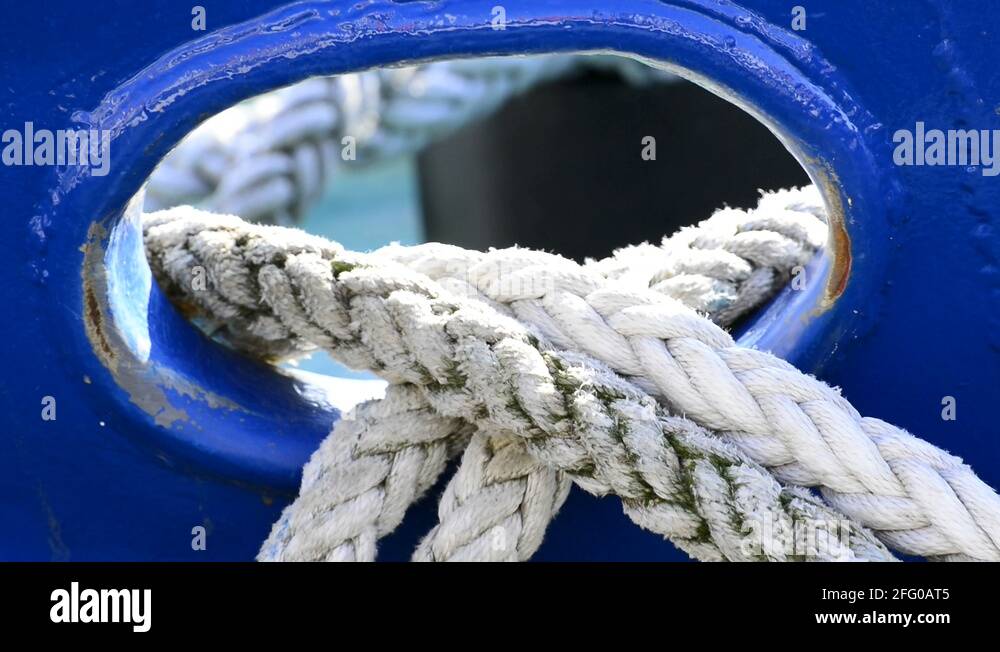 Swinging mooring line of a trawler Stock Video Footage Alamy