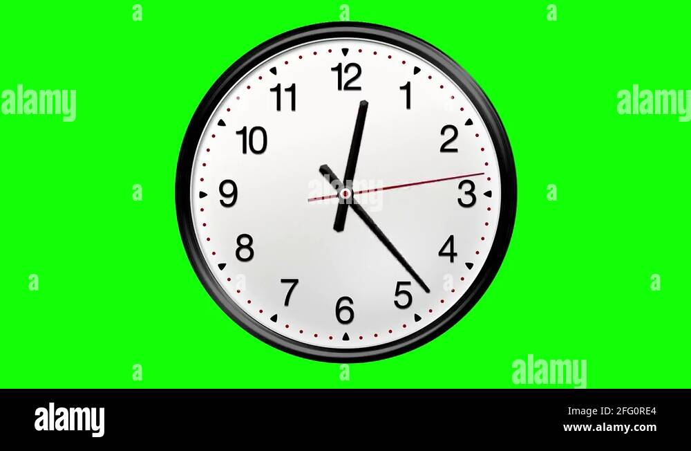 Large round clock counting down 12 hours over 30 seconds. Green screen
