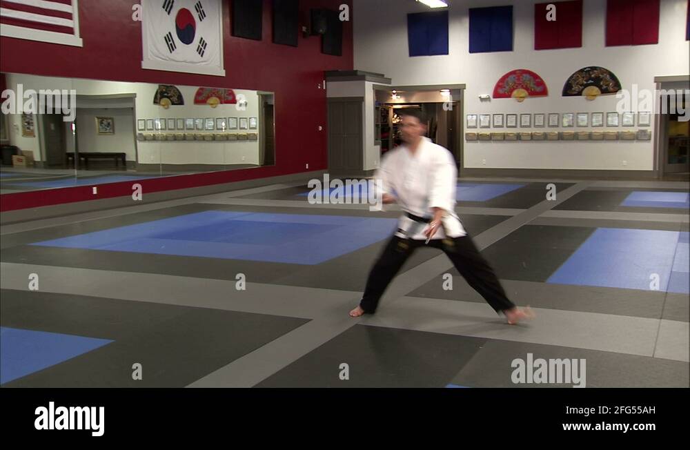 Martial arts instructor using sais in a karate studio Stock Video Footage Alamy