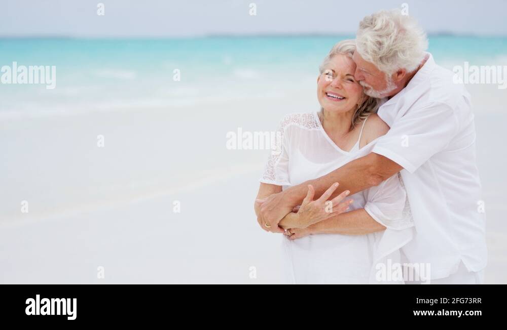 Romantic Mature Caucasian Couple Outdoors Together On Tropical Beach Stock Video Footage Alamy 4327