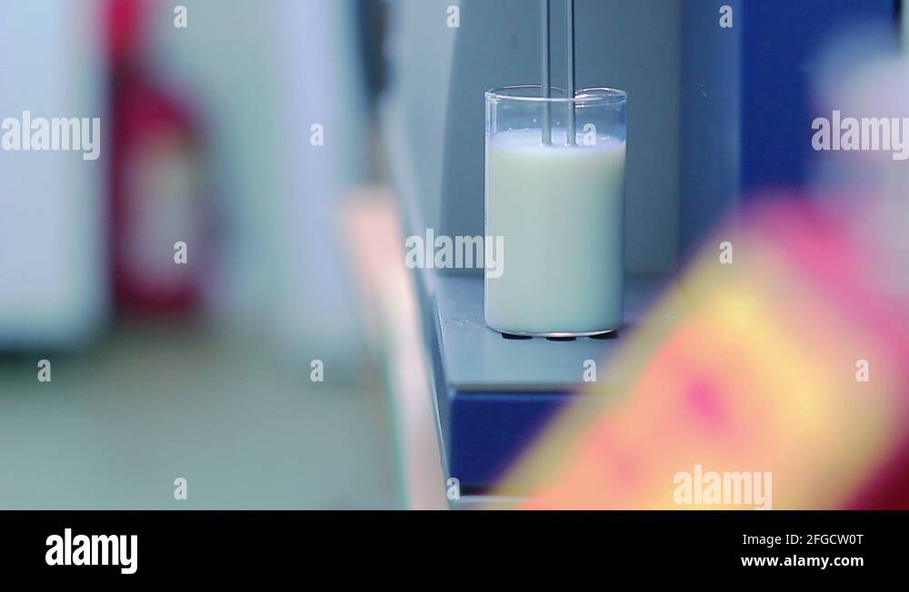 Milk analysis. Analysis of milk sample on laboratory equipment. Modern
