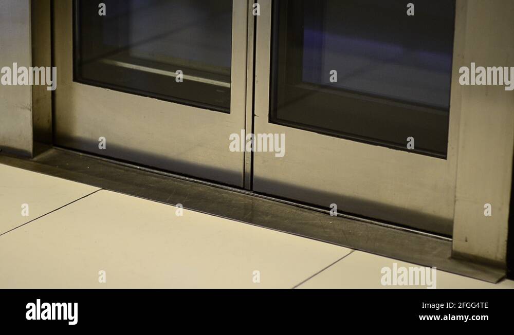 Elevator doors opening and closing Stock Video Footage Alamy