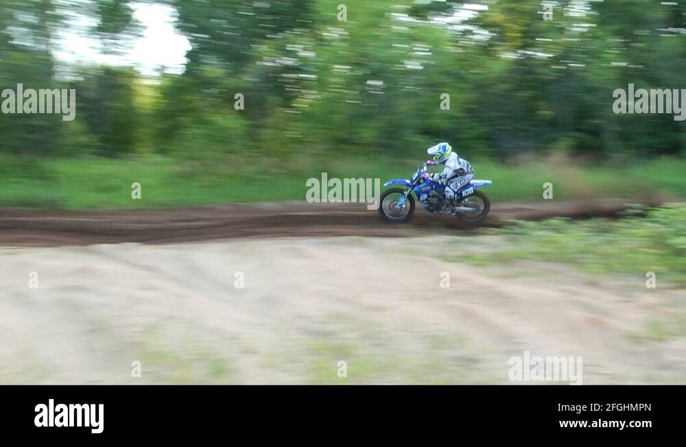 motocross dirt bike racer ripping and going fast Stock Video Footage