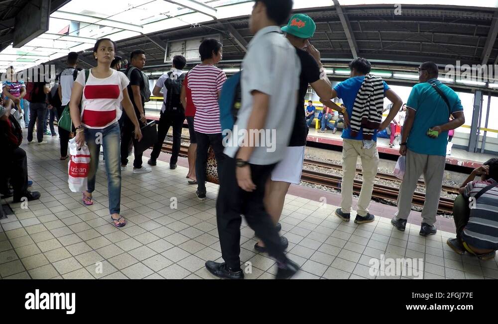 People wait for Arriving light rail train at station Stock Video Footage Alamy People wait for Arriving light rail train at station Stock Video Footage Alamy